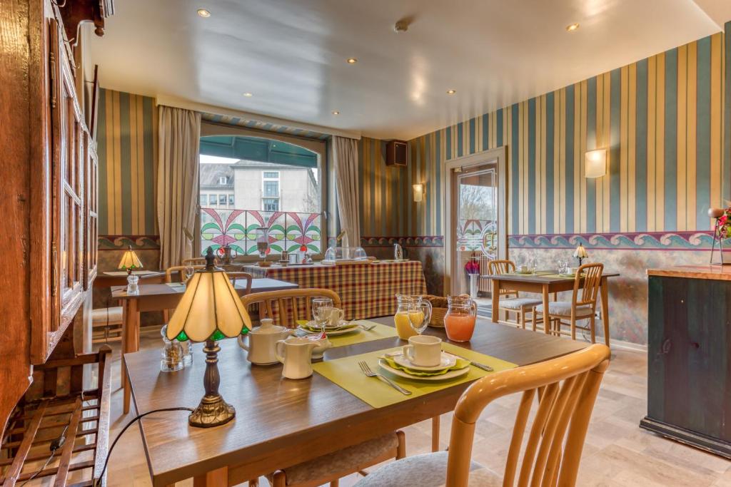 Posezení v ubytování Hôtel Le Cor de Chasse