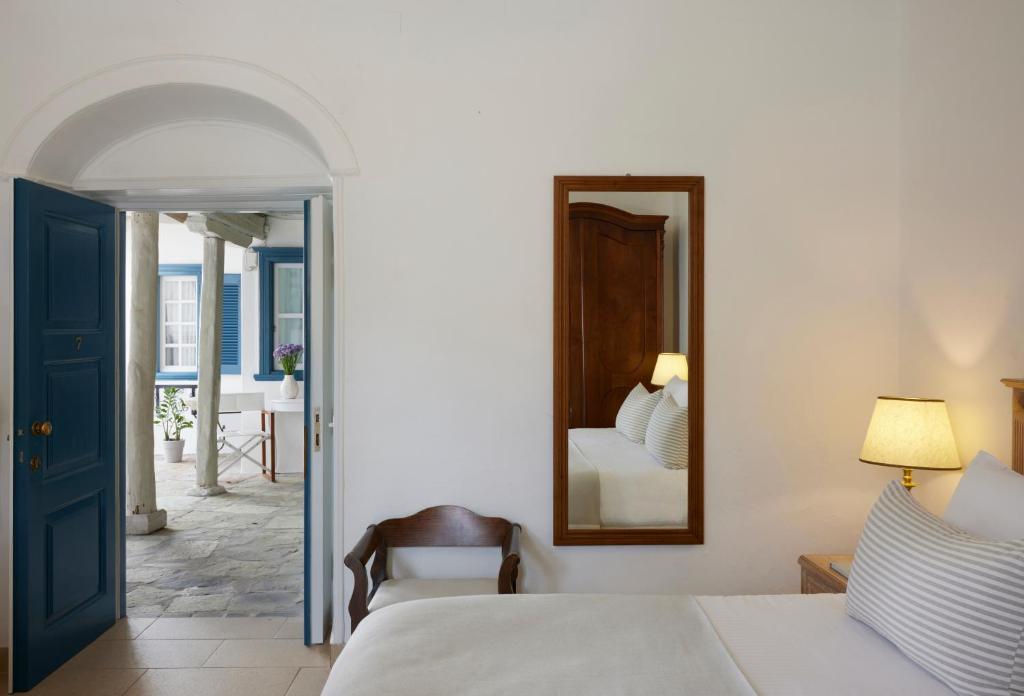 Postel nebo postele na pokoji v ubytování Orloff Boutique Hotel