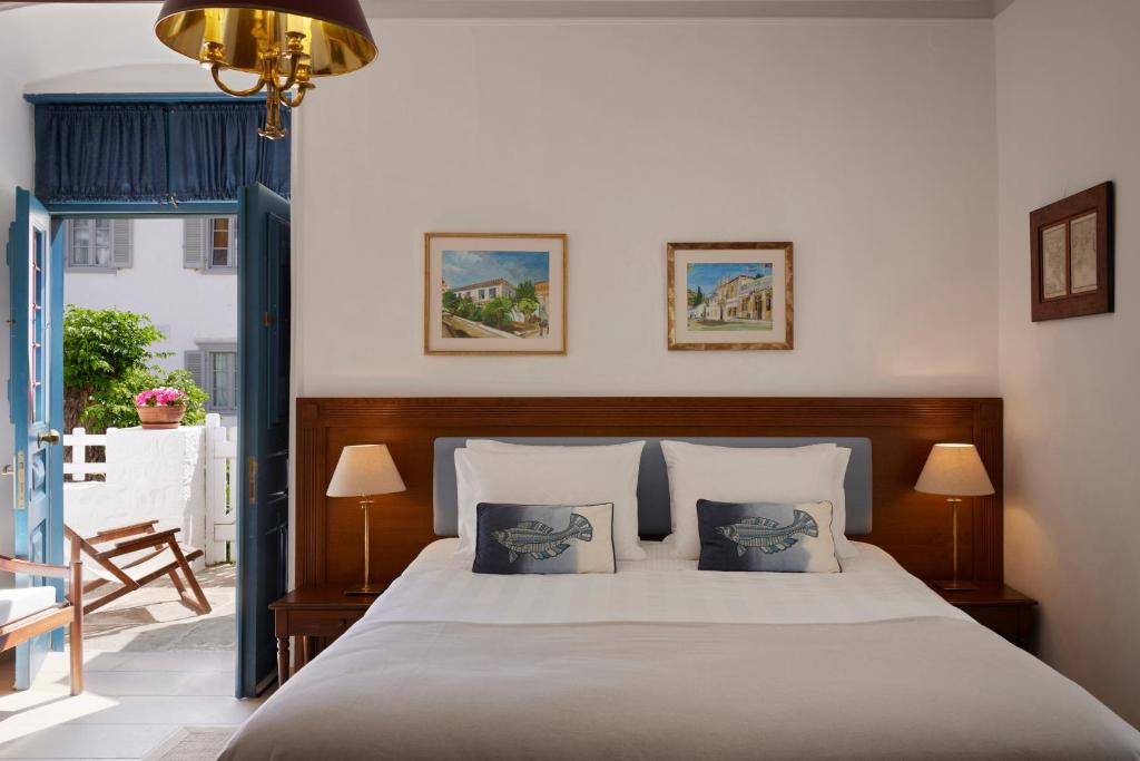 Postel nebo postele na pokoji v ubytování Orloff Boutique Hotel