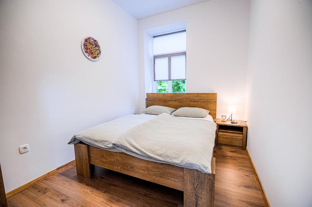 Postel nebo postele na pokoji v ubytování Guesthouse Pr'Šefu