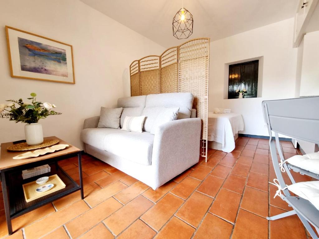Posezení v ubytování Apartamento con Patio Sevillano