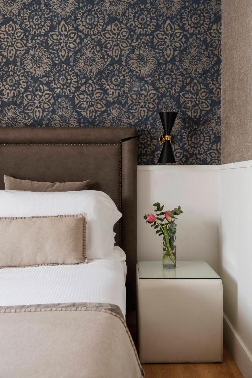 Postel nebo postele na pokoji v ubytování Hotel Maestrale
