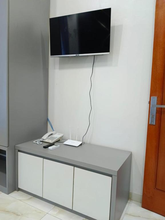 TV a/nebo společenská místnost v ubytování Algara Puncak Hotel