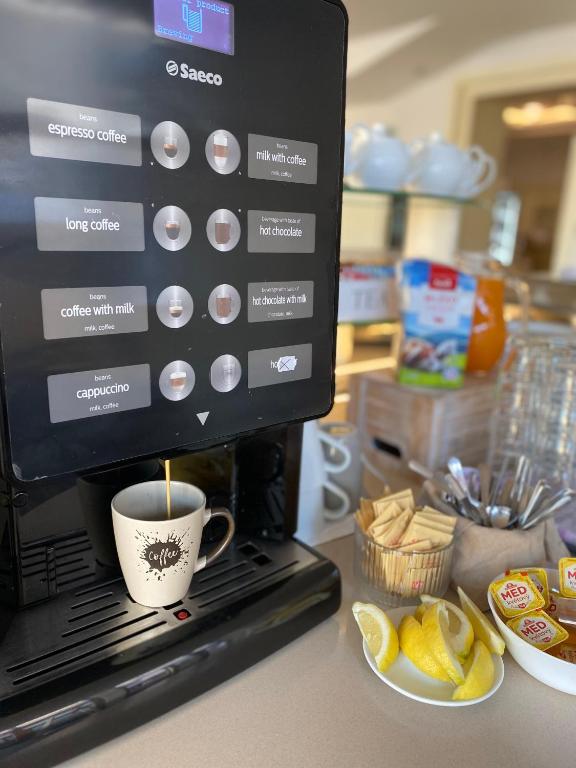 Köök või kööginurk majutusasutuses Hotel MAGISTR Vsetín