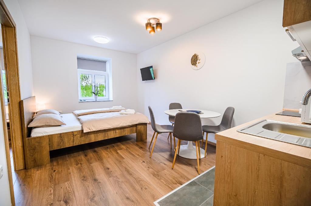 Postel nebo postele na pokoji v ubytování Guesthouse Pr'Šefu