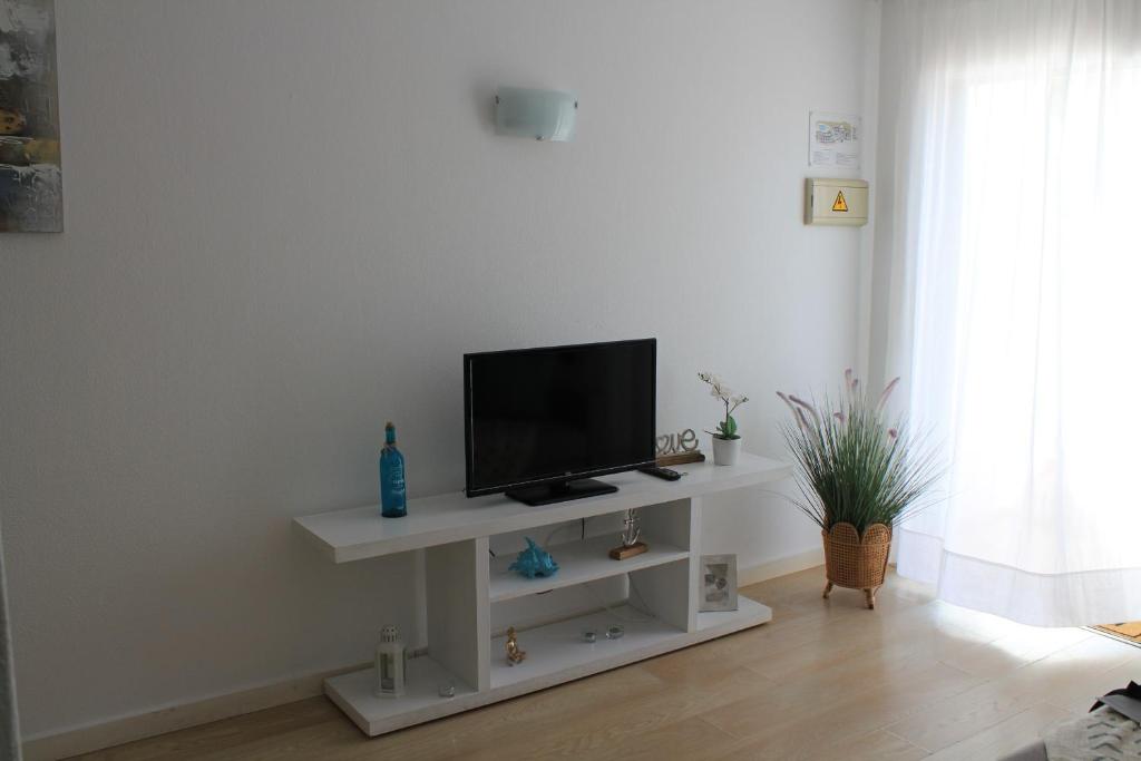Telewizja i/lub zestaw kina domowego w obiekcie Canaima 306