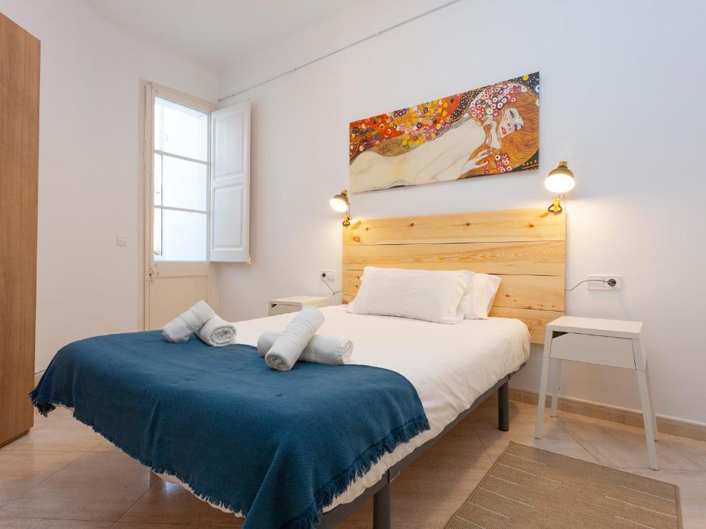 Posteľ alebo postele v izbe v ubytovaní Centric Sagrada Familia Apartments