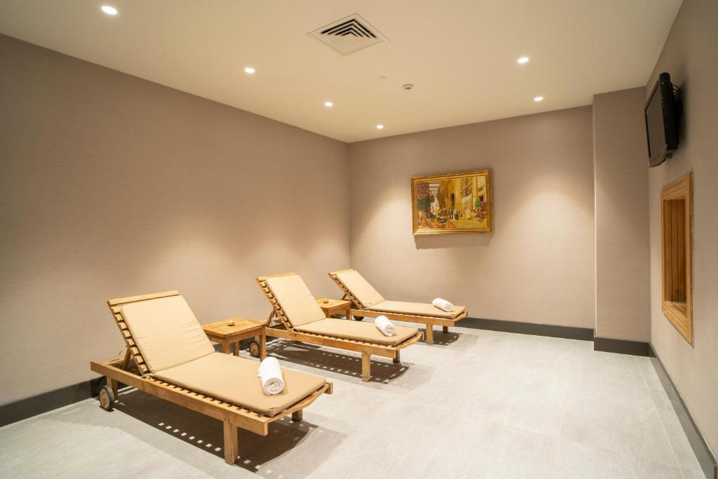 Arts Hotel Taksim的电视和/或娱乐中心