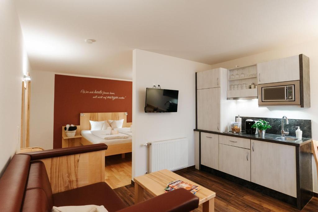 Kuchyň nebo kuchyňský kout v ubytování Burgls Apartmenthaus
