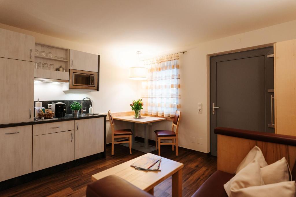 Kuchyň nebo kuchyňský kout v ubytování Burgls Apartmenthaus