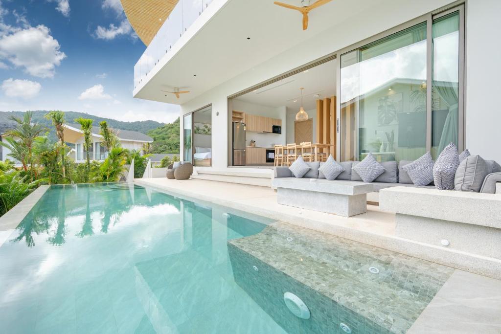 an image of a villa with a swimming pool at Himmapana Villas - Hills in Kamala Beach
