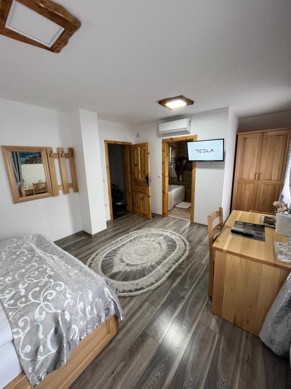 Posteľ alebo postele v izbe v ubytovaní Rustic Inn River