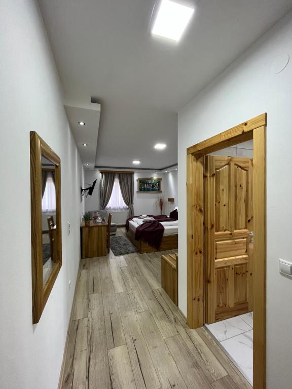 Posteľ alebo postele v izbe v ubytovaní Rustic Inn River