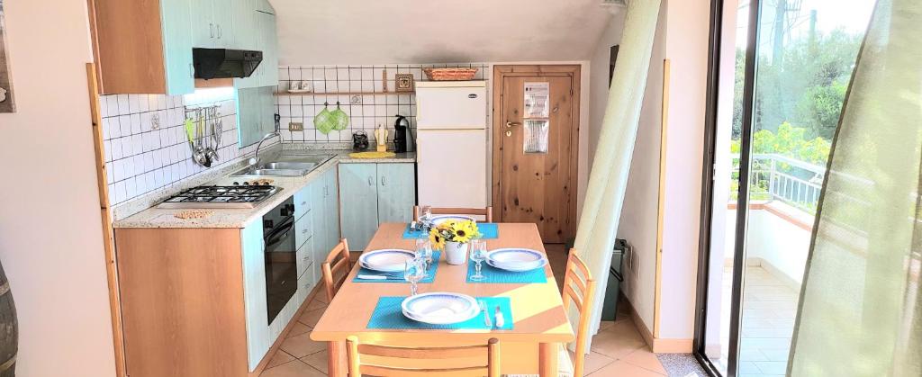 Kuchyňa alebo kuchynka v ubytovaní Villa Ilaria casa vacanza Capo Vaticano - Tropea