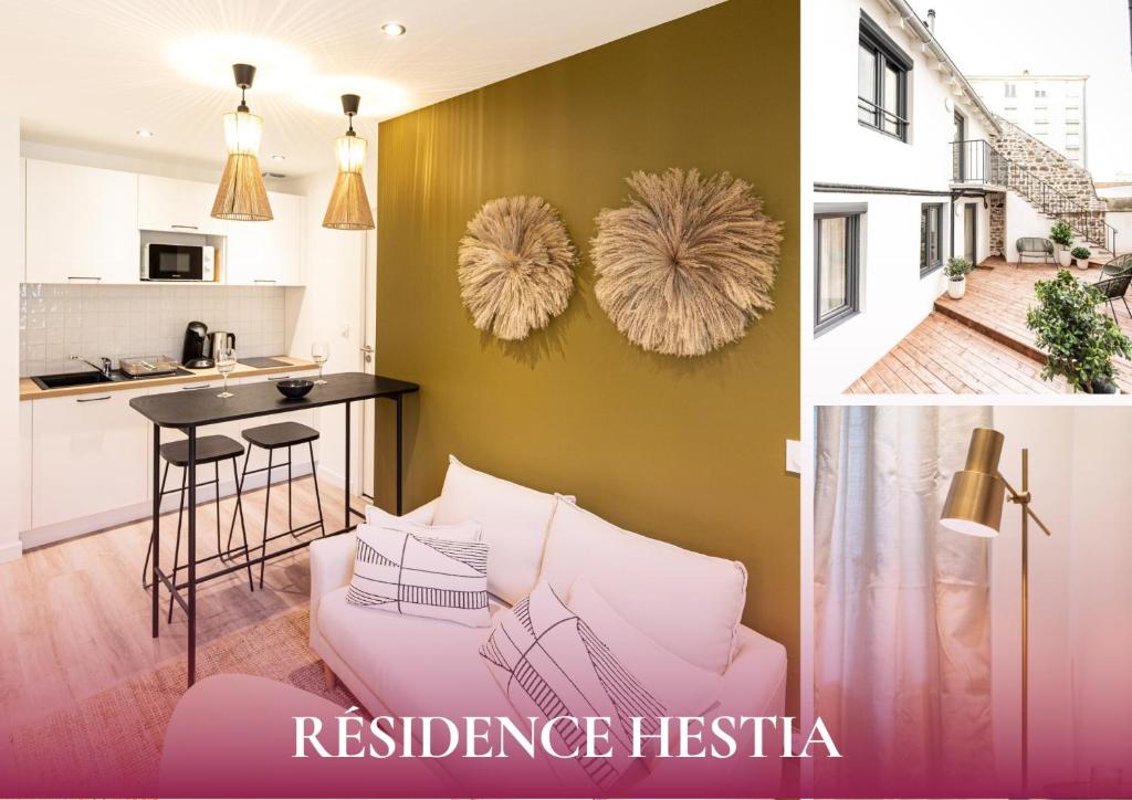 cocina y sala de estar con sofá rosa en L'Olympe - Résidence Hestia en Saint-Étienne
