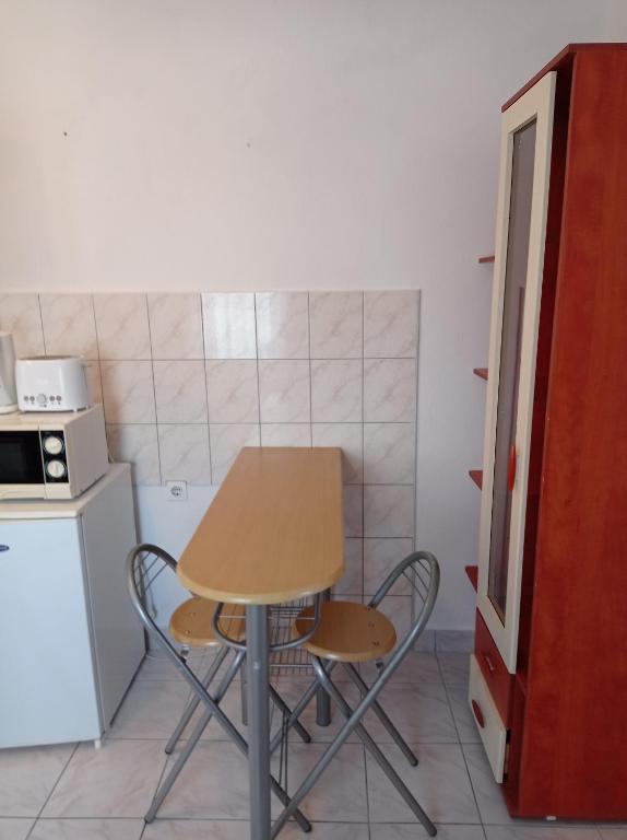 Kuchyň nebo kuchyňský kout v ubytování Apartments Milinkovic