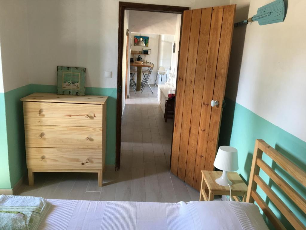 Postel nebo postele na pokoji v ubytování Villa Monte dos Pinheiros