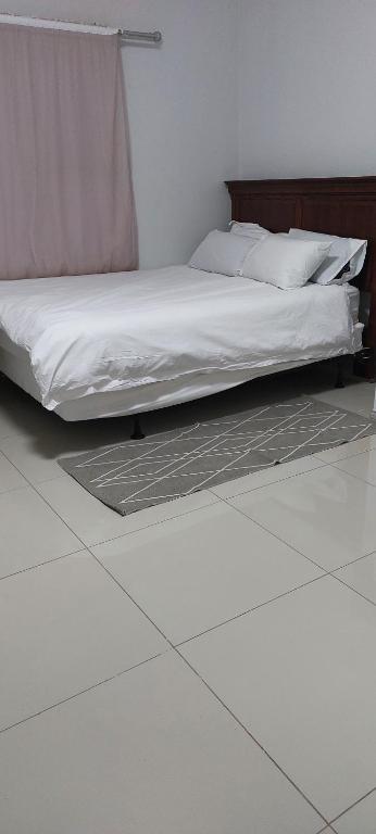 Ένα ή περισσότερα κρεβάτια σε δωμάτιο στο Special Inn Bed and Breakfast