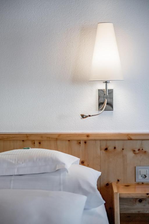 Postel nebo postele na pokoji v ubytování Hotel Nevada
