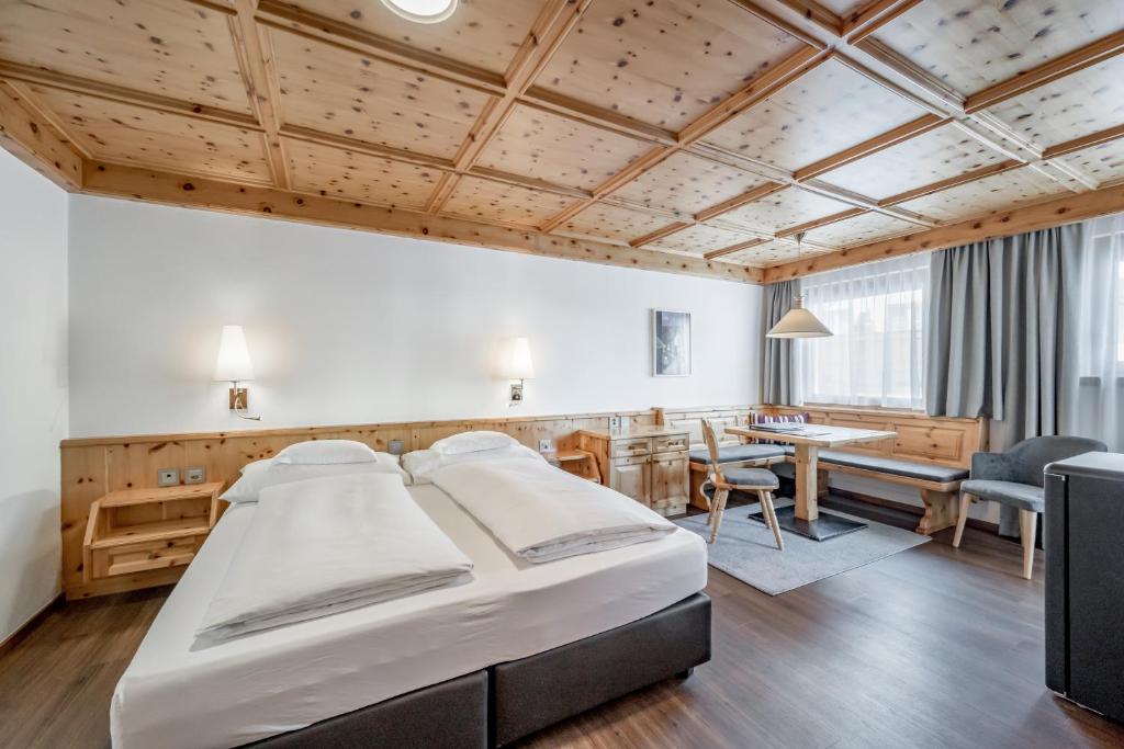 Postel nebo postele na pokoji v ubytování Hotel Nevada
