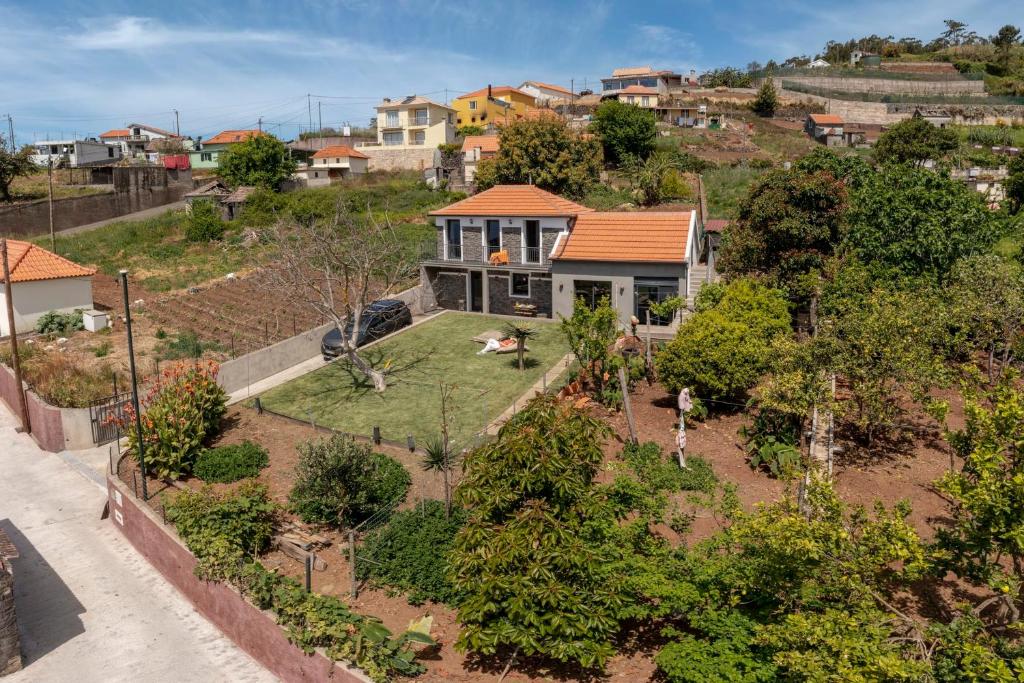 an aerial view of a house with a garden at Casinha dos Canhas by An Island Apart in Ponta do Sol