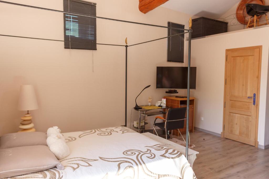 Postel nebo postele na pokoji v ubytování Au Coq Bleu