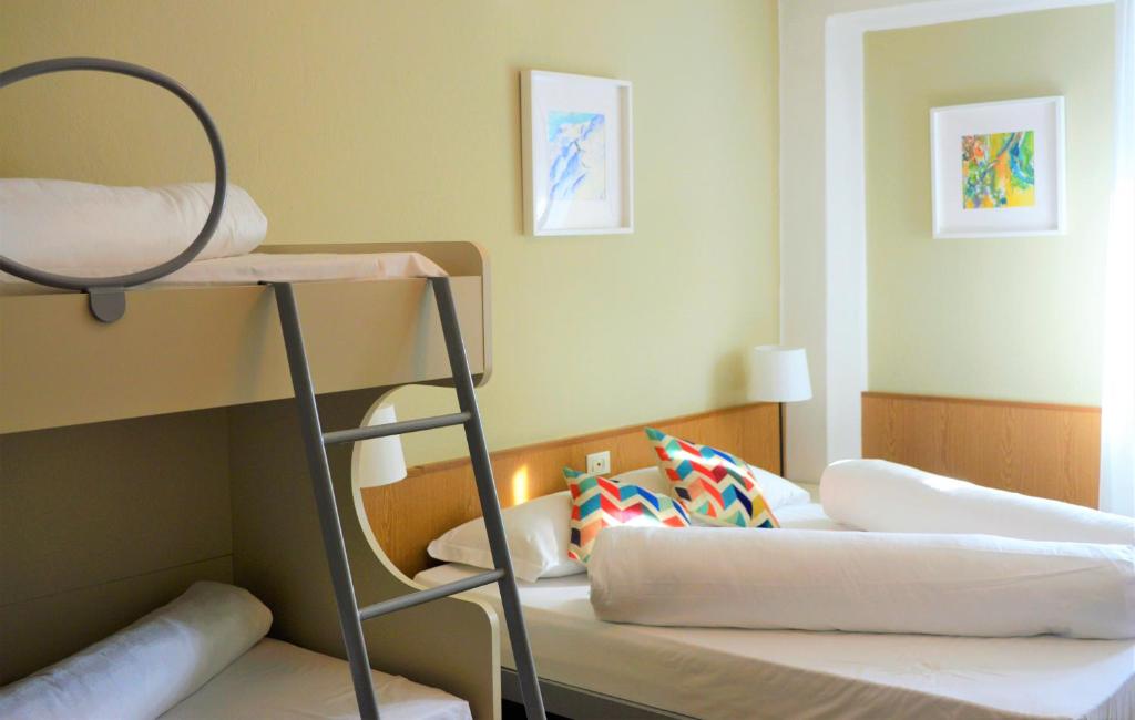 Postel nebo postele na pokoji v ubytování Park Hotel Sancelso