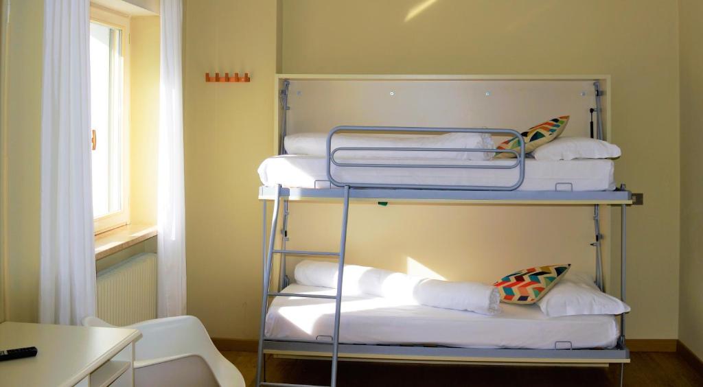 Postel nebo postele na pokoji v ubytování Park Hotel Sancelso