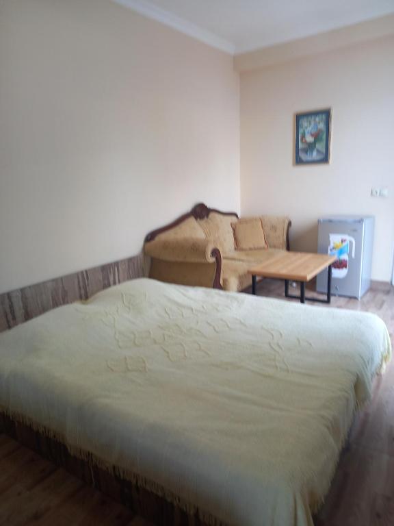 Postel nebo postele na pokoji v ubytování Magnetic Sand Hotel