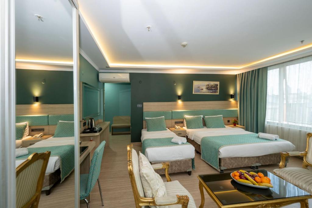 Postel nebo postele na pokoji v ubytování The Hotel Ottoman City Istanbul