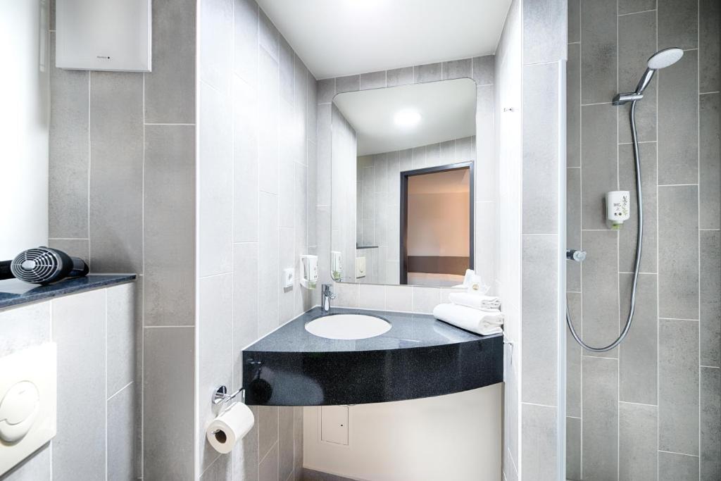 Koupelna v ubytování B&B HOTEL München-Airport