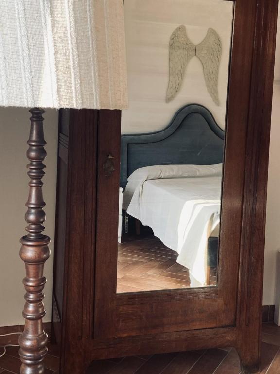 A bed or beds in a room at Villa Cipriano