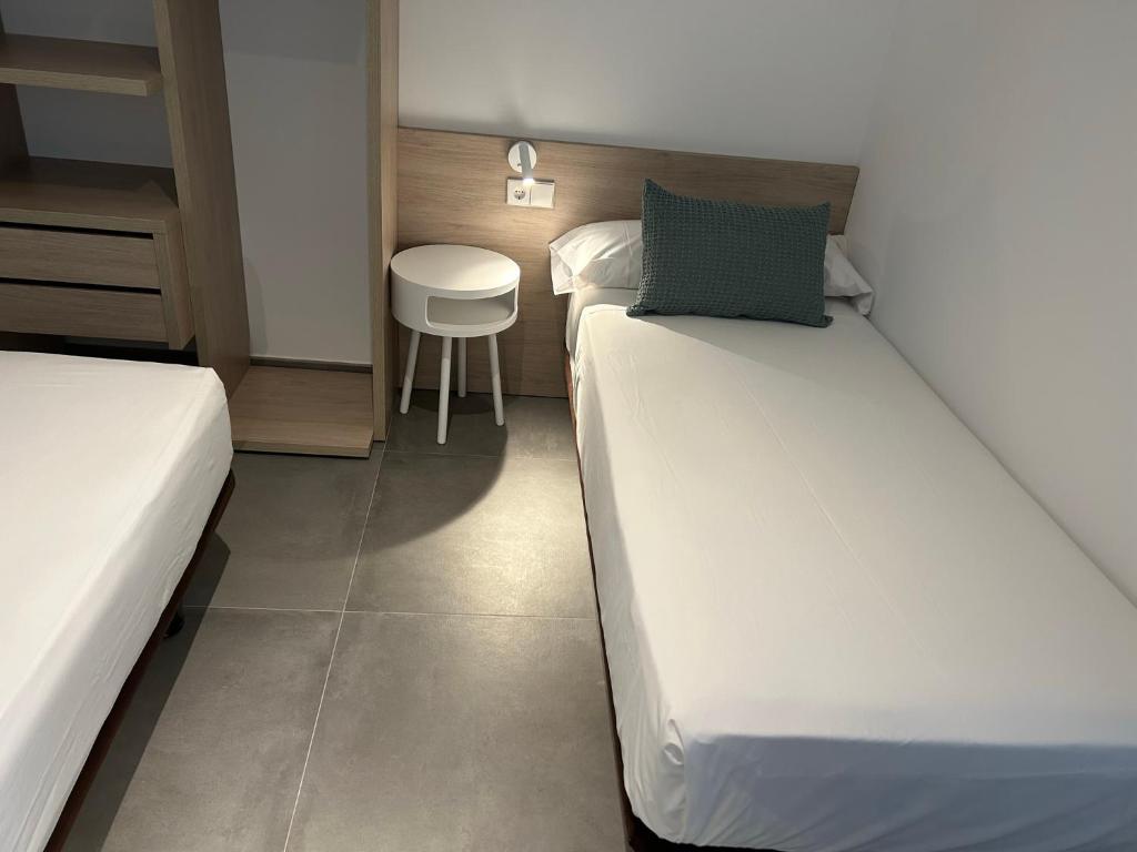 Posteľ alebo postele v izbe v ubytovaní El Centre, 3 habitacions, 2 banys i cuina