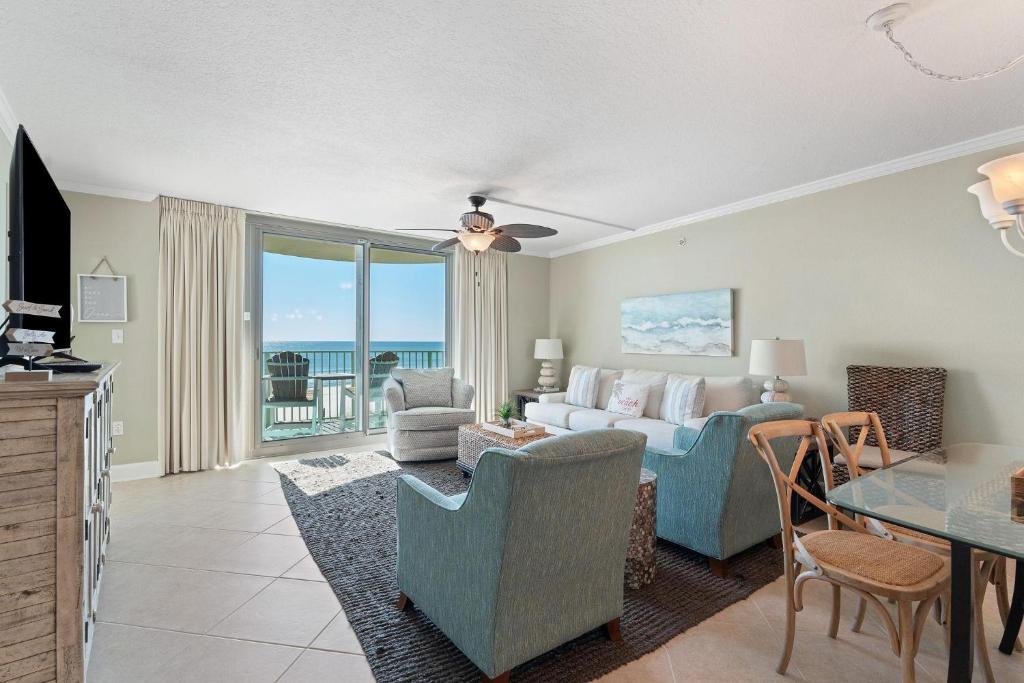 a living room with a couch and a table at Perdido Towers East 403 in Perdido Key