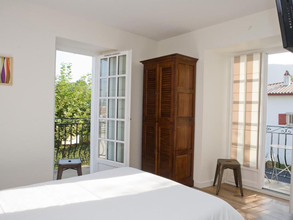 Postel nebo postele na pokoji v ubytování Hotel Residence Alaïa