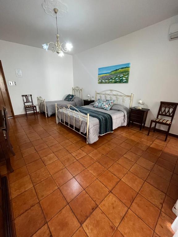 Le Stanze di Lucia vicino Ospedale Cardinale Panico a Tricase - Estudio Familiar