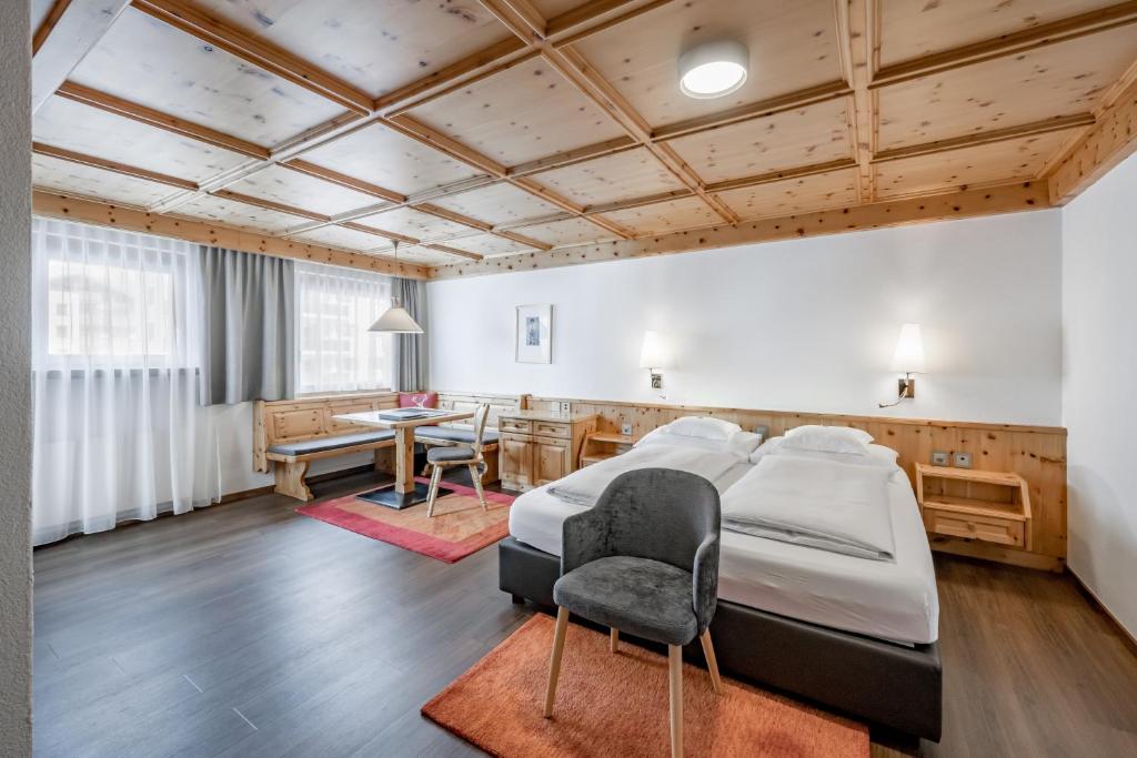 Postel nebo postele na pokoji v ubytování Hotel Nevada