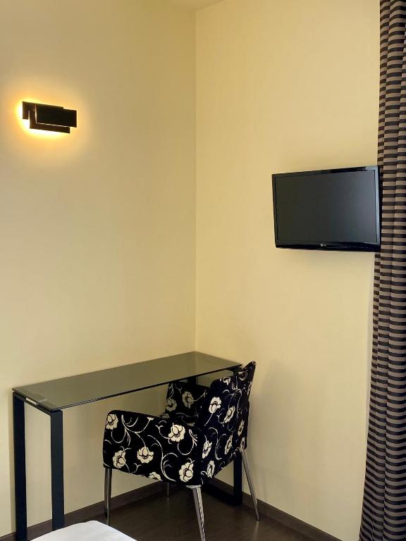 TV a/nebo společenská místnost v ubytování Hotel Campagnola