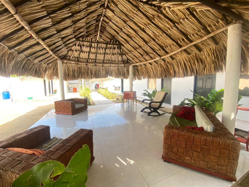 Posezení v ubytování Hostal El Danubio Tolu