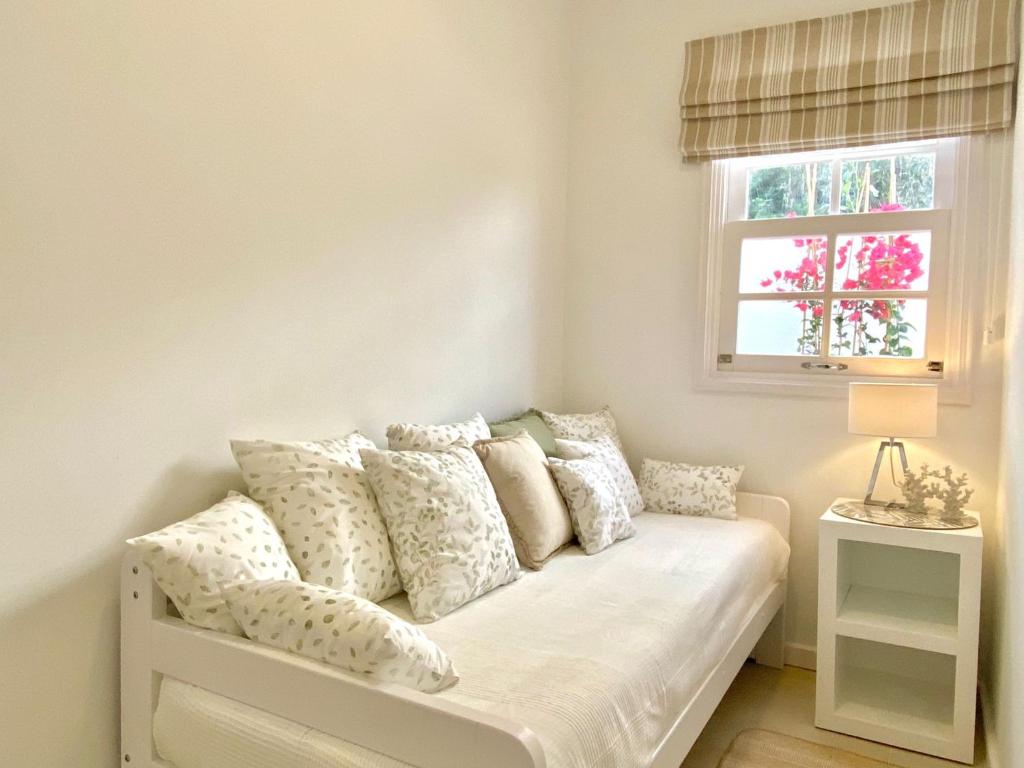 Posteľ alebo postele v izbe v ubytovaní Casa Boticaria, bonito Paraíso Privado con jardín y Jacuzzi.