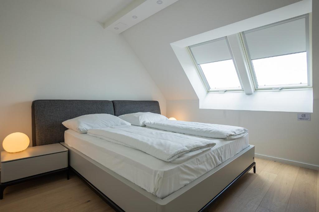 Cama o camas de una habitación en Modern 2 floor two bedroom apartment on a rooftop