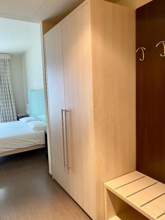 Postel nebo postele na pokoji v ubytování Hotel Campagnola
