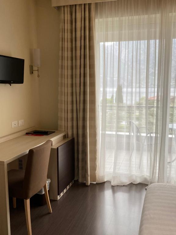 TV a/nebo společenská místnost v ubytování Hotel Campagnola