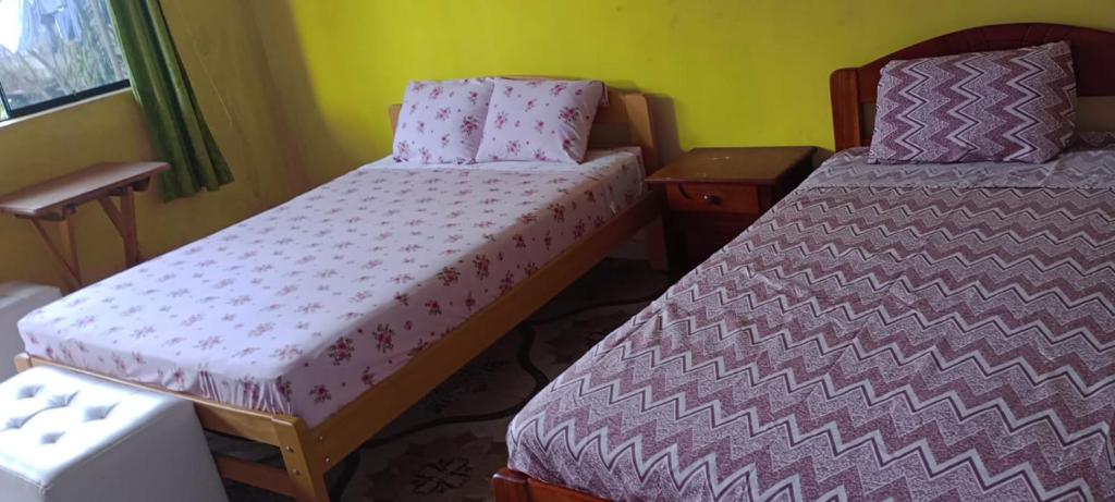 Ένα ή περισσότερα κρεβάτια σε δωμάτιο στο koryares haushostel