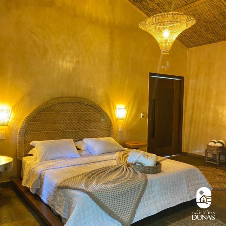 Postel nebo postele na pokoji v ubytování Pousada Rancho das Dunas