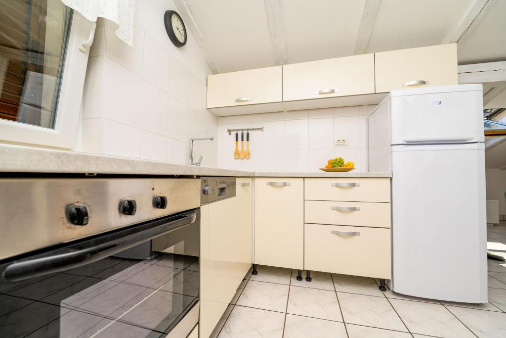 Kuchyň nebo kuchyňský kout v ubytování House Rosa