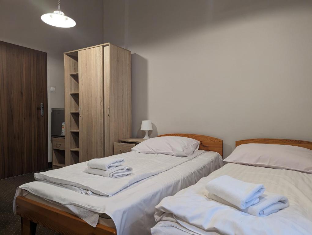 Postel nebo postele na pokoji v ubytování OSW Świnoujście Rybitwa