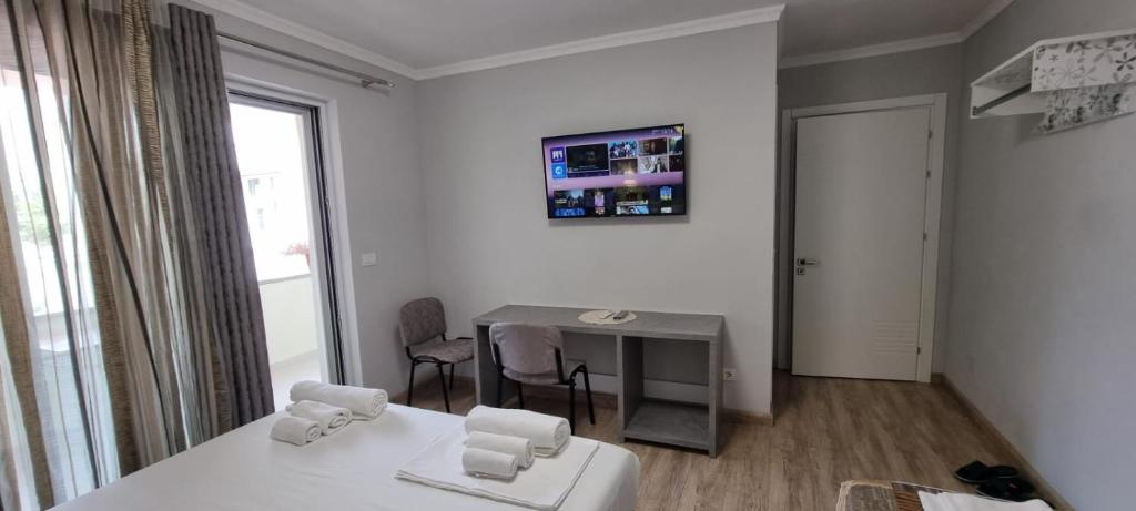 Postel nebo postele na pokoji v ubytování AAA Apartment