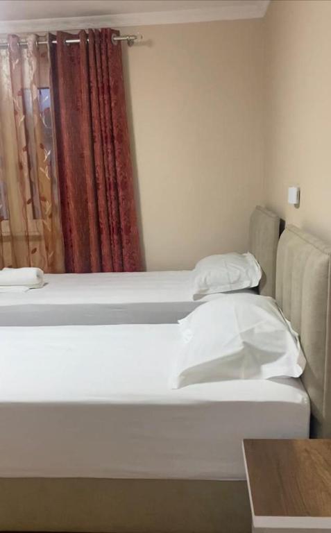 Postel nebo postele na pokoji v ubytování AAA Apartment