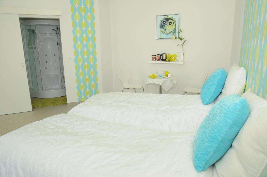 Postel nebo postele na pokoji v ubytování Hotel CoCo Aps
